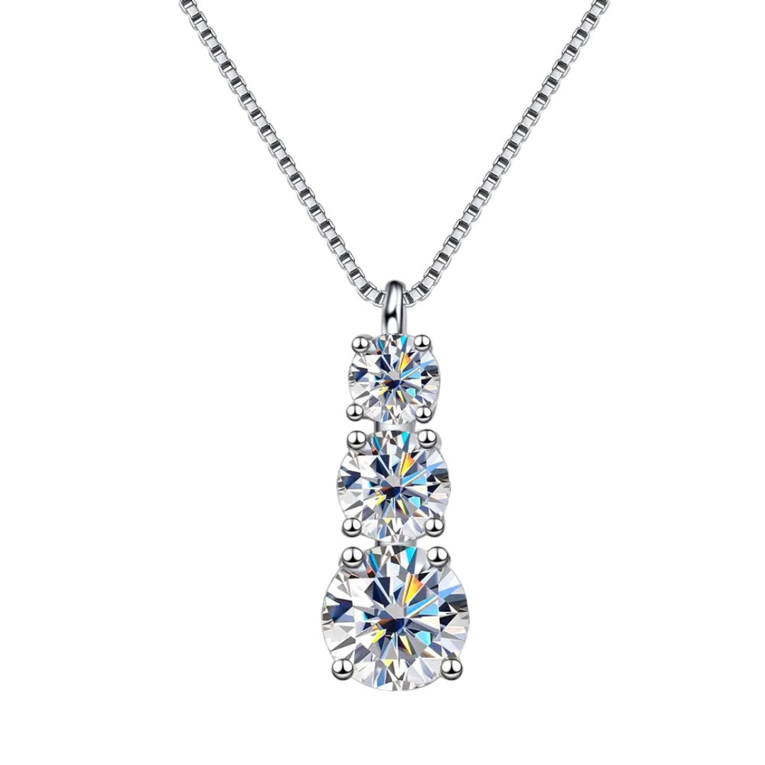 Elara 3-stone Moissanite Pendant Necklace: A stunning piece of jewelry featuring three sparkling moissanite gemstones set in a sleek pendant design. Perfect for adding elegance and sophistication to any outfit. 