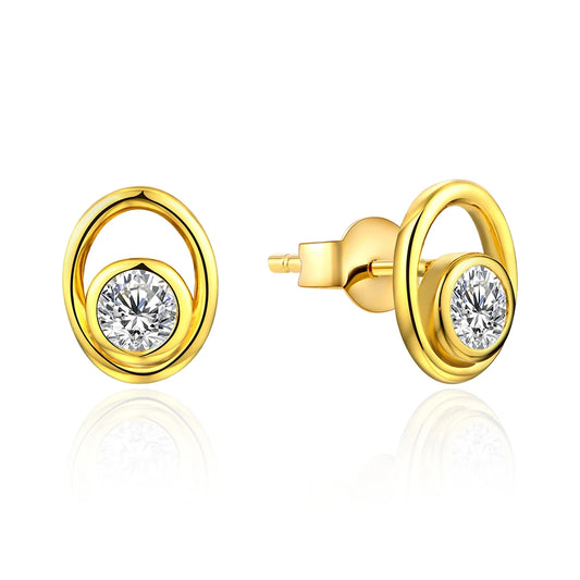Elevate your style with our Willow Round Cut Moissanite Stud Earrings. These elegant earrings feature a dainty, oval-shaped design with a round cut solitaire, elegantly placed in a bezel setting. Available in solid gold or sterling silver, these earrings make the perfect addition to any luxury collection. Complete the look with Willow necklace and ring.