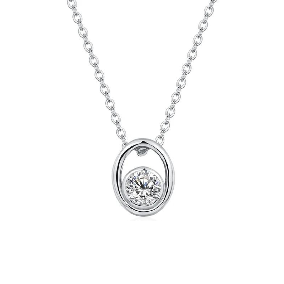 This Willow necklace features a sparkling round cut moissanite stone, set in either sterling silver or solid gold (10K, 14K, 18K). With high quality craftsmanship and a timeless design, this elegant pendant will add a touch of class to your everyday wear. Plus, with a moissanite stone that lasts forever, this necklace is truly an investment in luxury jewelry. Complete the look with Willow earrings and ring.